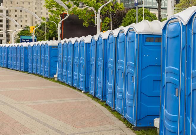 a row of portable restrooms at a fairground, offering visitors a clean and hassle-free experience in fairfield